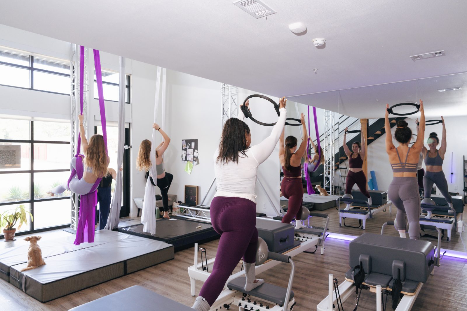 A group class combining Pilates and aerial silks at the AER studio in South Austin — AER Method Pilot Study